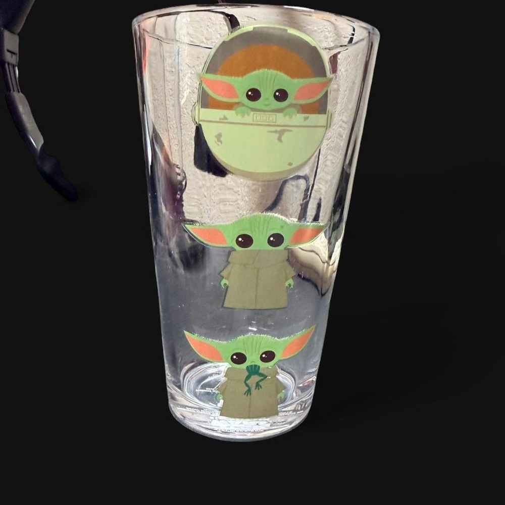 Star Wars Baby Yoda pint glass with three green Baby Yoda